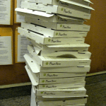 Tower of empty pizza boxes